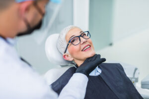 woman smiling at the dentist